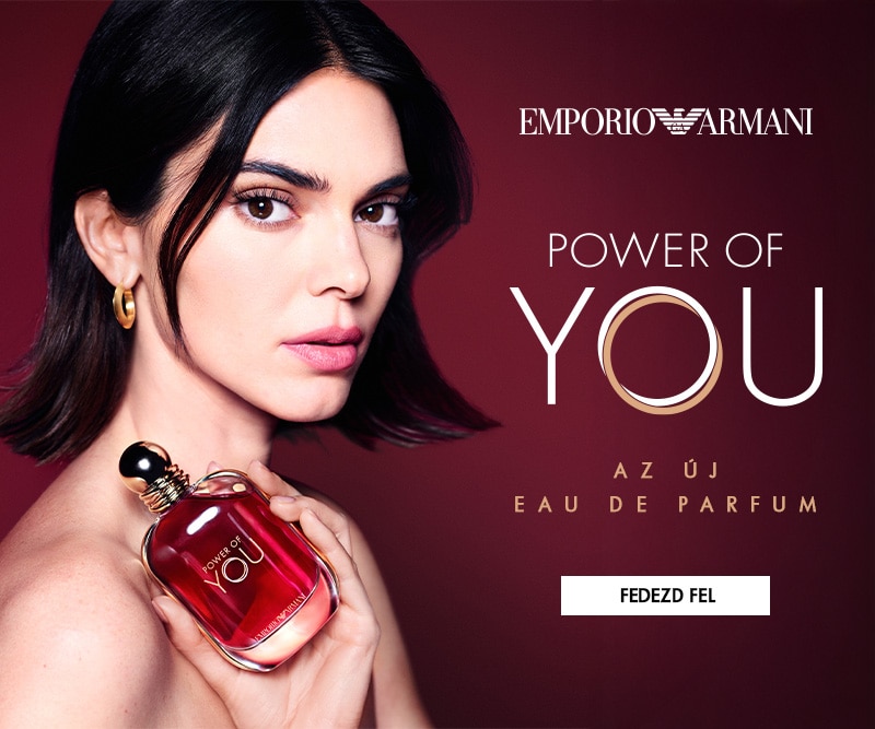 Emporio Armani Power of You parfüm piros üvegben, elegáns bordó hátterű reklámbanneren.