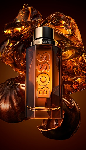 HBO_SCENT_EDPI_W_26_marionnaud-one-grid-293x510-02.jpg Hugo Boss The Scent férfi parfüm borostyánszín üvegben, fűszeres és intenzív háttérrel.