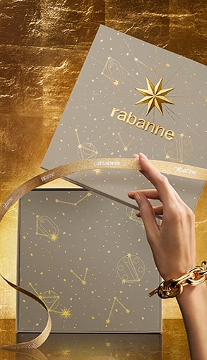 Rabanne luxus ajándékdoboz arany csillagmintával és elegáns szalaggal, prémium parfüm csomagolás online vásárláshoz