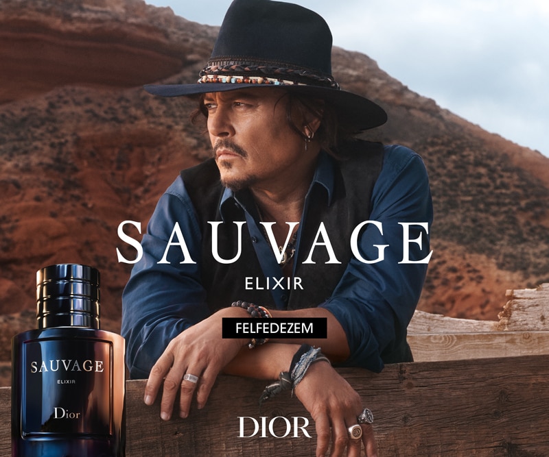 Dior Sauvage Elixir parfüm – reklám híres színésszel hegyes háttérrel, parfüm üvege a bal alsó sarokban, felfedezés gombbal