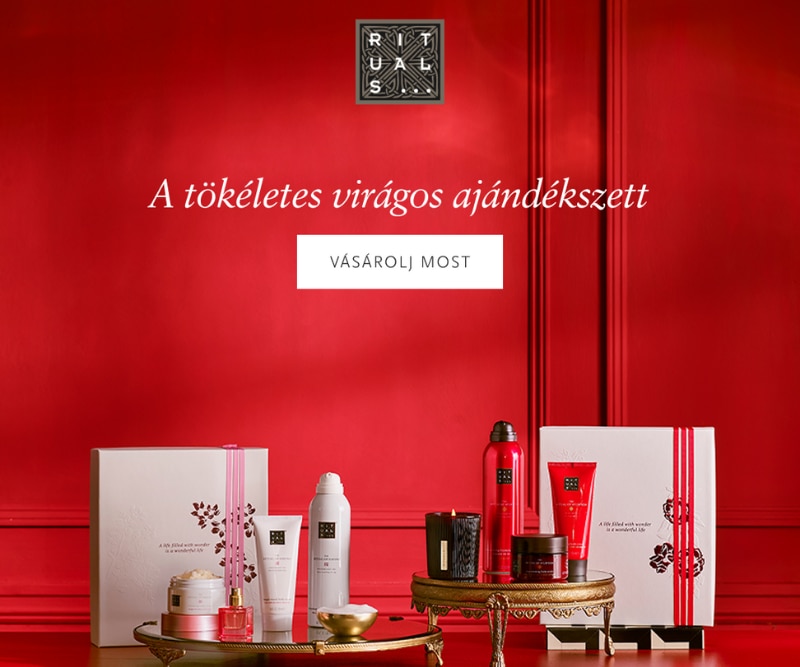 Rituals virágos ajándékszett piros háttéren – testápolási termékek, díszdobozok és &apos;Vásárolj Most&apos; gomb, tökéletes ajándék nőknek